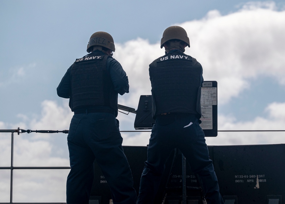 Sailors fire M2A1 .50 caliber machine gun