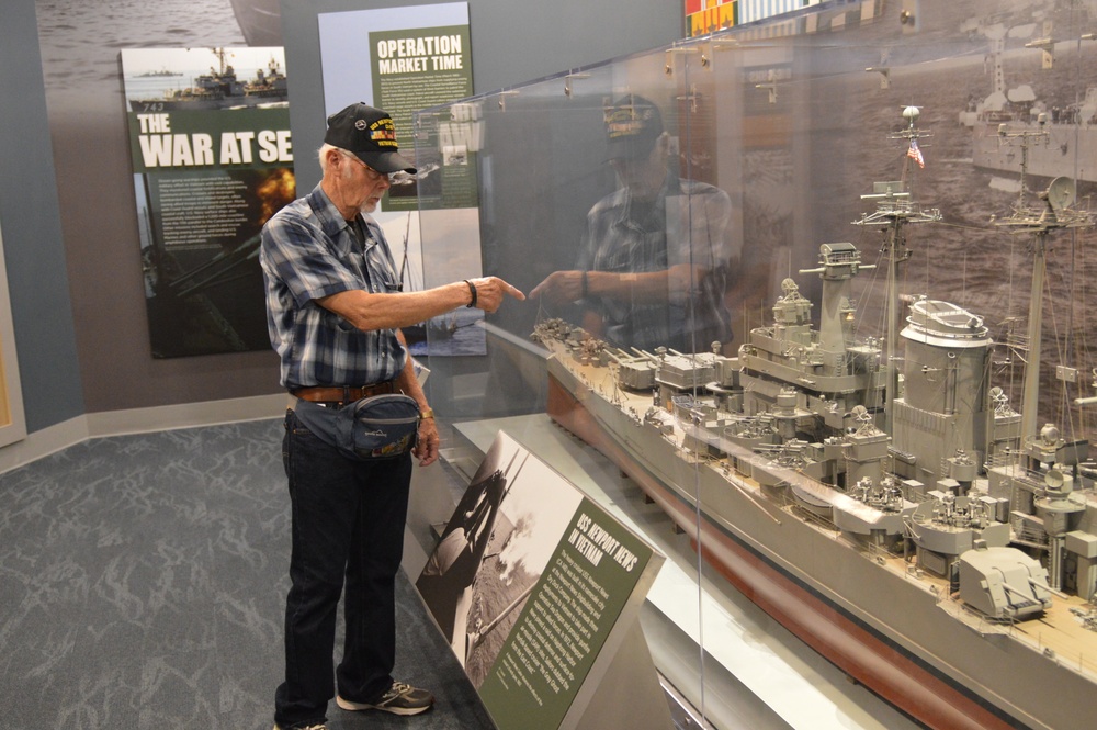 USS Newport News (CA 148) veteran visits Vietnam Exhibit at Naval Museum