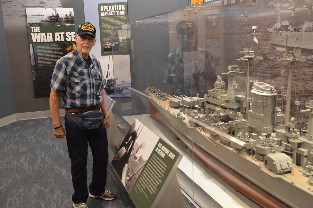 USS Newport News (CA 148) veteran visits Vietnam Exhibit at Naval Museum