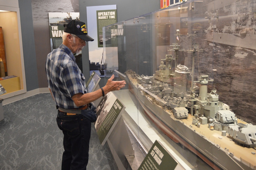 USS Newport News (CA 148) veteran visits Vietnam Exhibit at Naval Museum