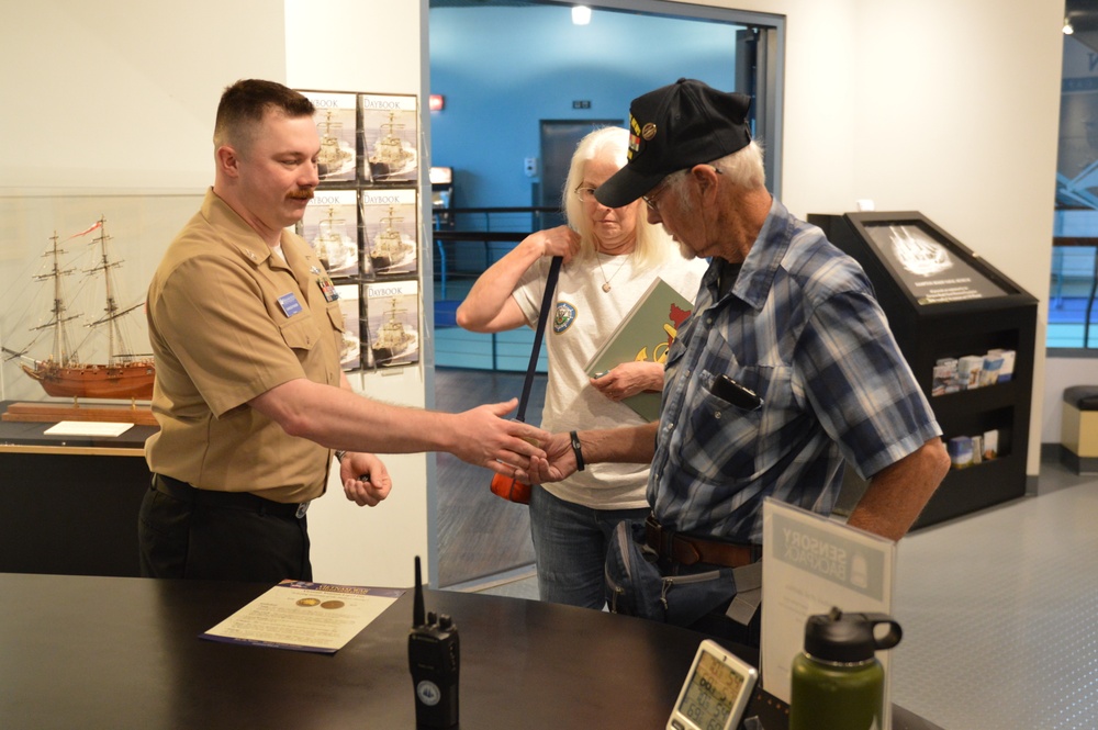 USS Newport News (CA 148) veteran visits Vietnam Exhibit at Naval Museum