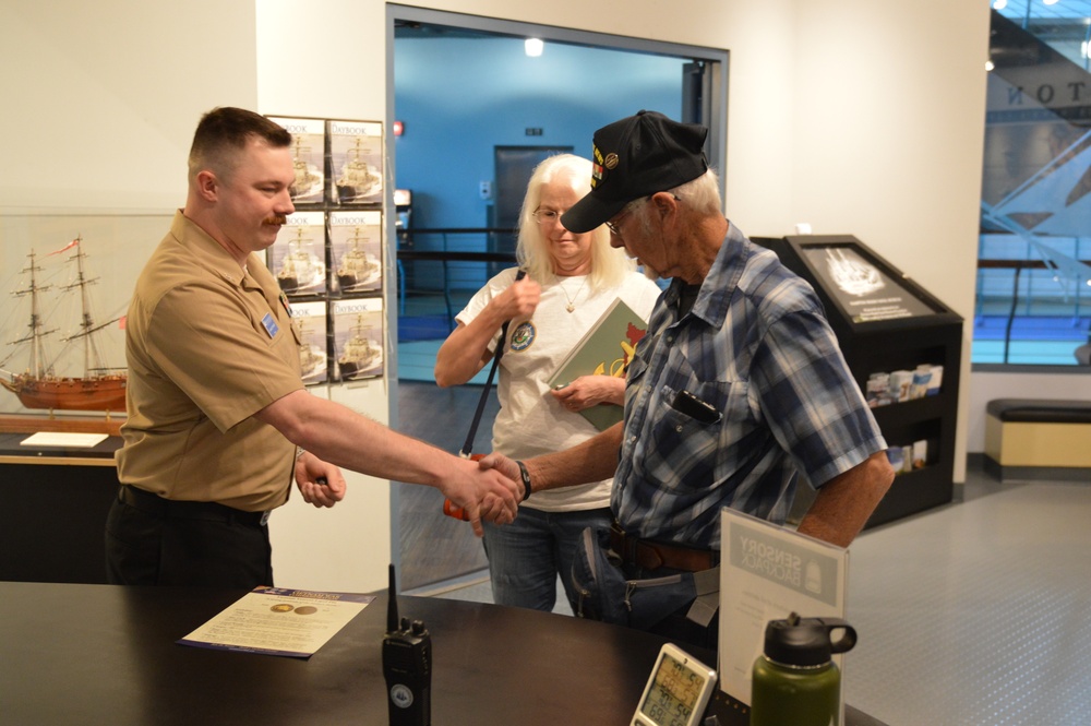 USS Newport News (CA 148) veteran visits Vietnam Exhibit at Naval Museum