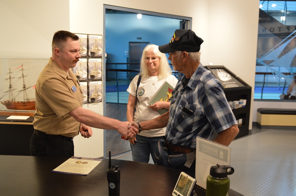 USS Newport News (CA 148) veteran visits Vietnam Exhibit at Naval Museum