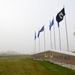 Heavy fog covers a sign at the front of the base entrance at Minot Air Force Base