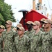 Coast Guard Vice Adm. Kevin Lunday, Atlantic Area Commander, presents the crew of the USS Hershel &quot;Woody&quot; Williams with the Coast Guard Special Operations Service Ribbon