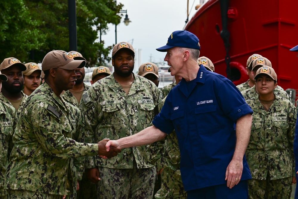 Coast Guard Vice Adm. Kevin Lunday, Atlantic Area Commander, presents the crew of the USS Hershel &quot;Woody&quot; Williams with the Coast Guard Special Operations Service Ribbon