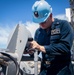Sailor conducts maintenance on the 1MC