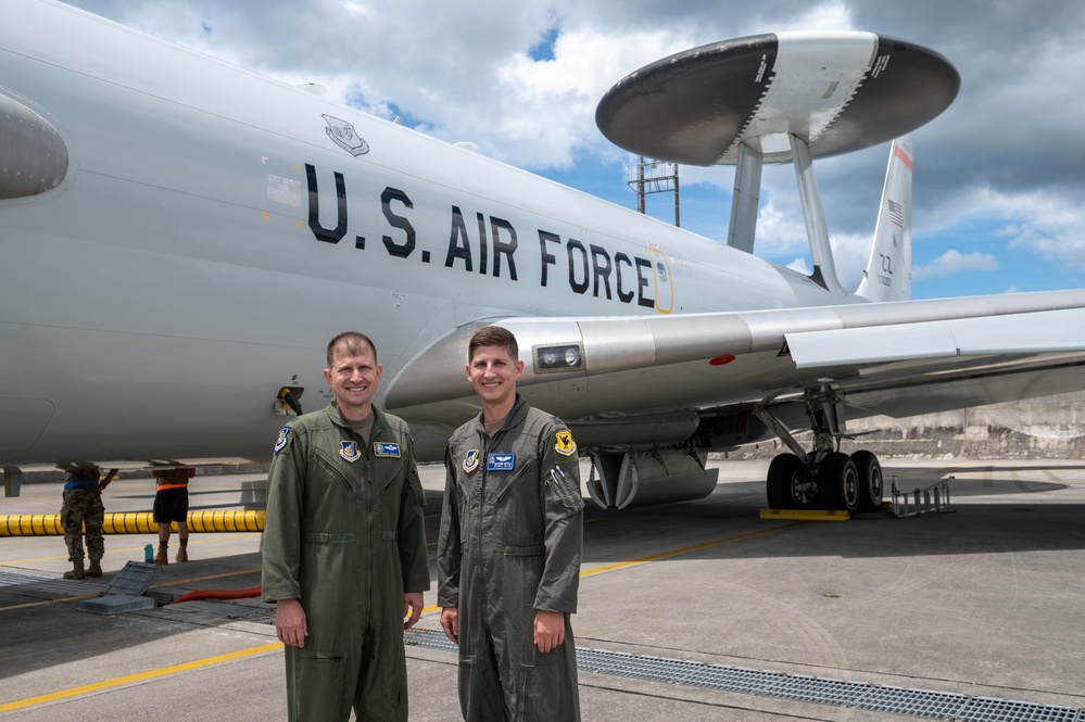 Father passes baton to son during final flight