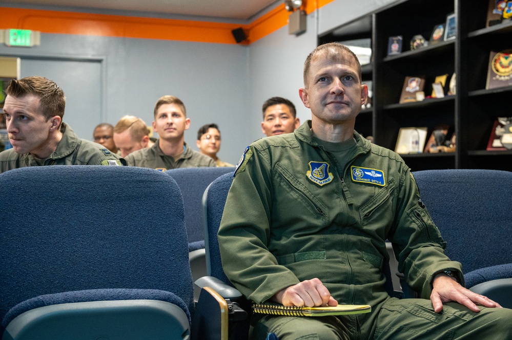 Father passes baton to son during final flight
