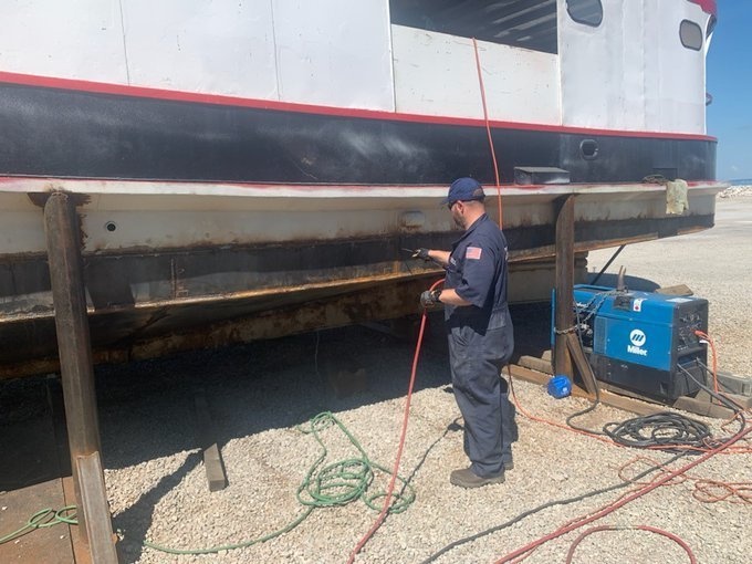 Marine inspectors from MSU Toledo check hull repairs
