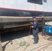 Marine inspectors from MSU Toledo check hull repairs