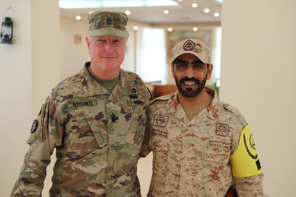 Command Sgt. Maj. Steven Stuenkel meets with the 15th Brigade of the Kuwait Land Force