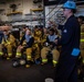 Sailors recieve instruction at staging area aboard USS Carl Vinson