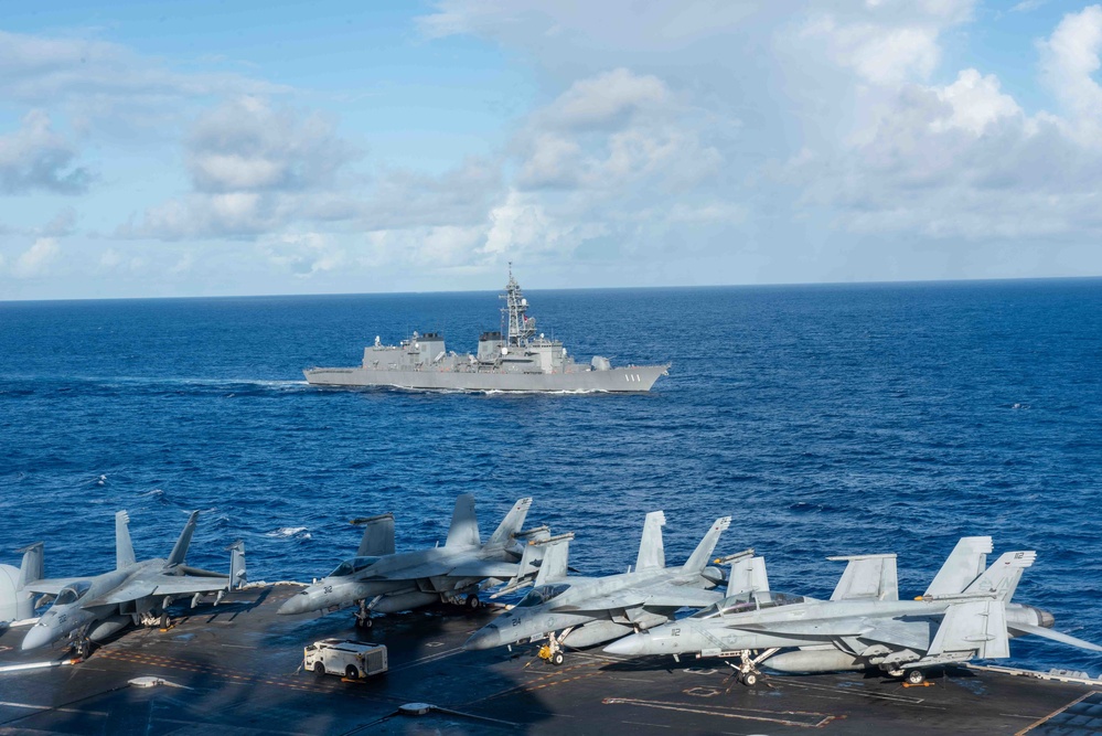 USS Ronald Reagan (CVN 76) holds a Photo exercise with the Japanese Maritime Self Defense Force