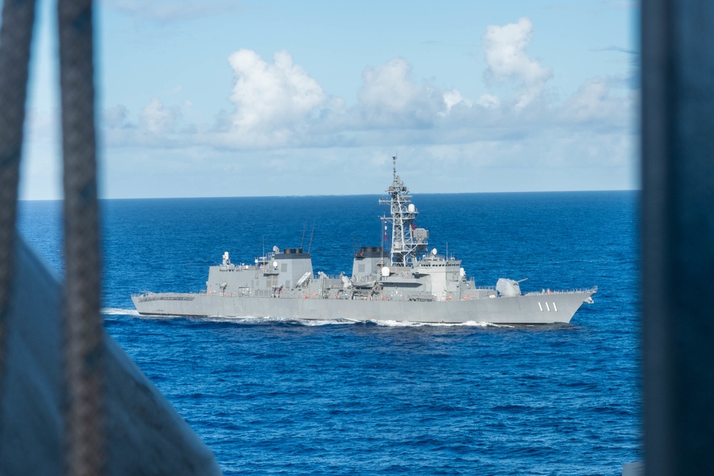 USS Ronald Reagan (CVN 76) holds a Photo exercise with the Japanese Maritime Self Defense Force