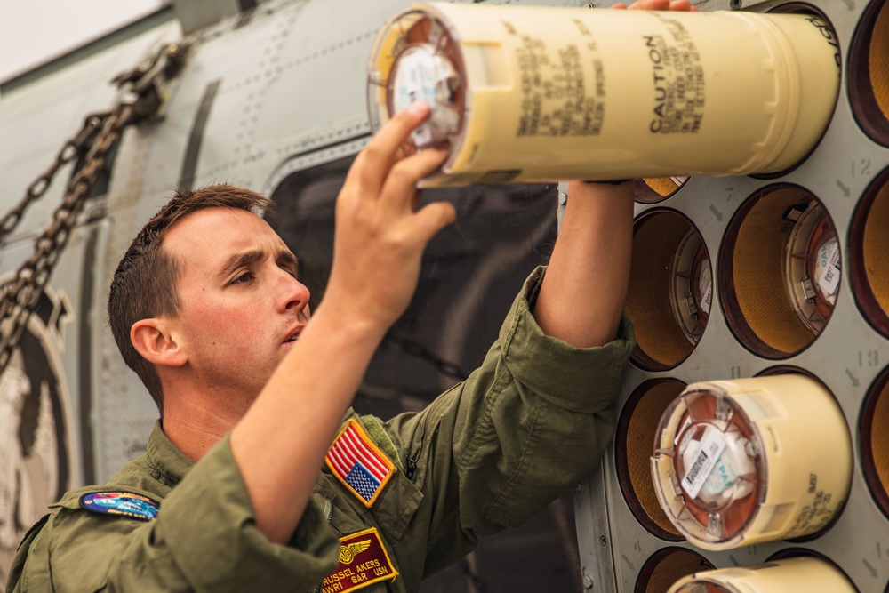 HSM 79, DET 2 Sailors Load Sonobuoys into MH-60R aboard DDG 117