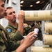 HSM 79, DET 2 Sailors Load Sonobuoys into MH-60R aboard DDG 117