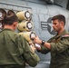 HSM 79, DET 2 Sailors Load Sonobuoys into MH-60R aboard DDG 117