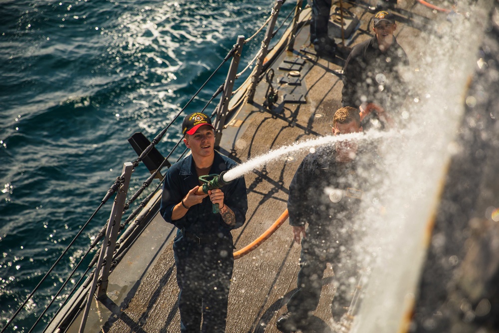 USS Paul Ignatius (DDG 117) Sailors Conduct Fresh Water Wash Down