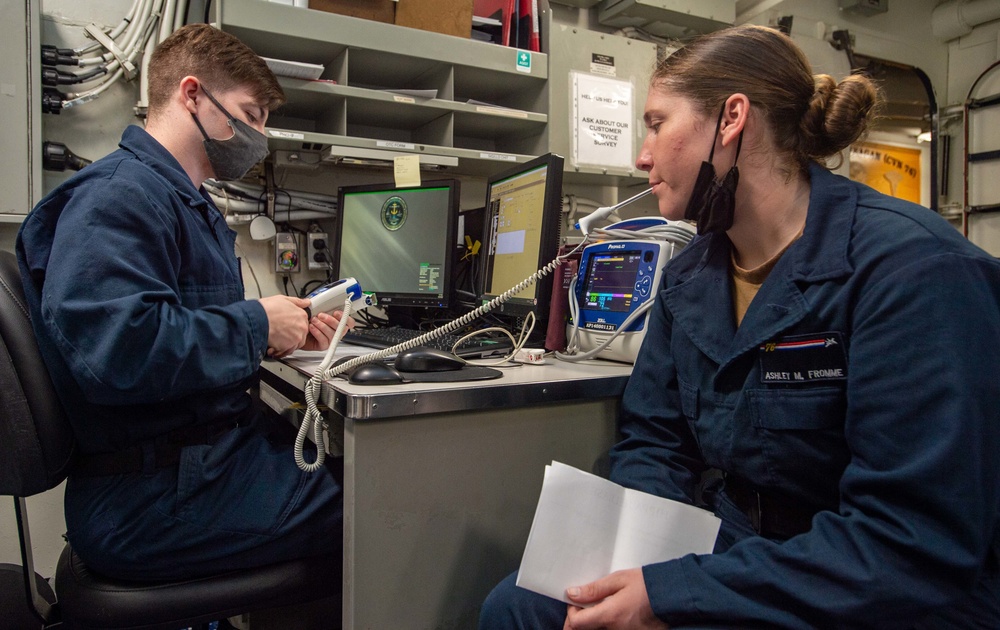 USS Ronald Reagan (CVN-76) Medical Sailors perform daily tasks
