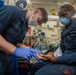 USS Ronald Reagan (CVN-76) Medical Sailors perform daily tasks