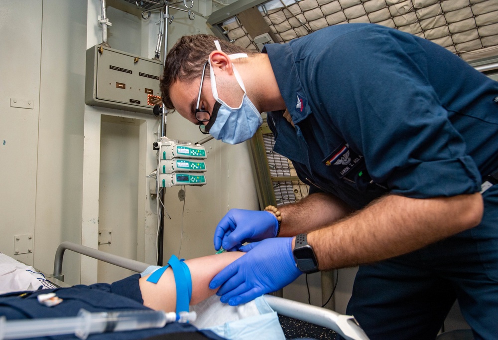 USS Ronald Reagan (CVN-76) Medical Sailors perform daily tasks