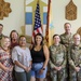 21st TSC spouse sponsors pay it forward and gain volunteer work experience