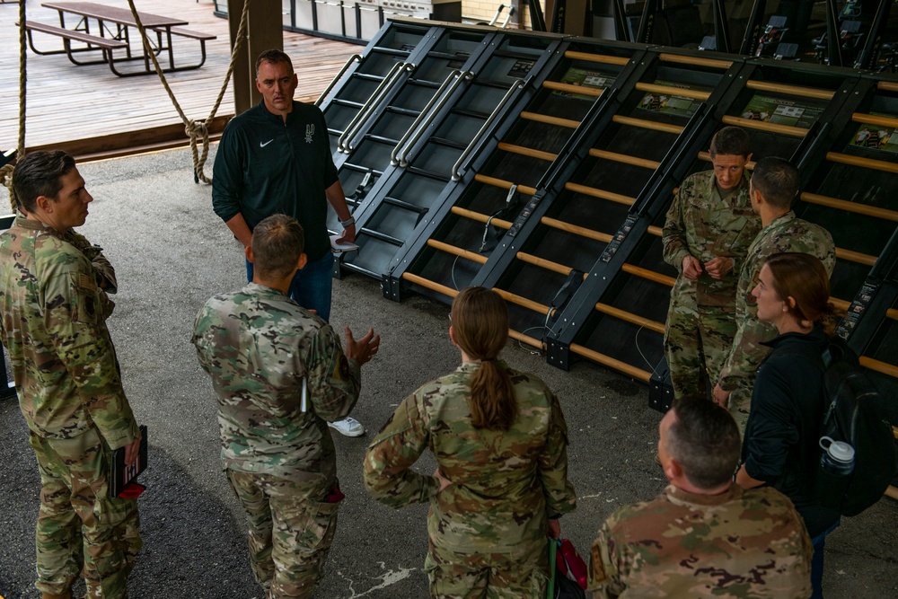 Special Warfare Training Wing discuss human performance integration with Spurs staff
