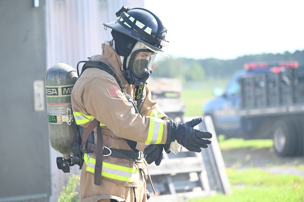 908 CES firefighters conduct annually required structure fire training