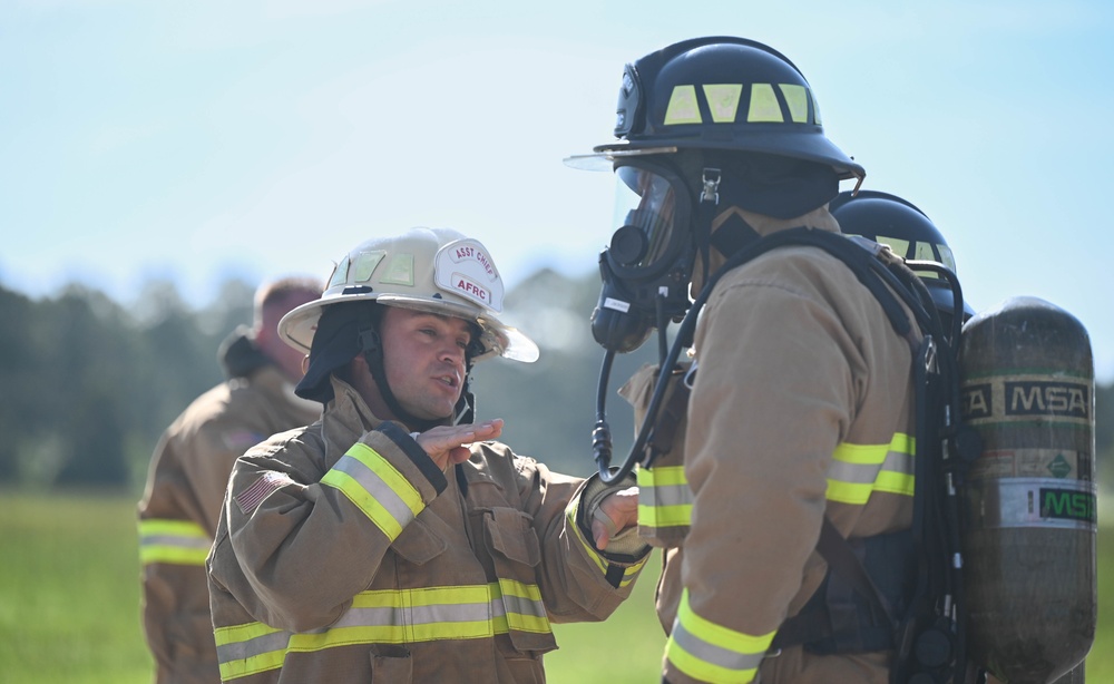 908 CES firefighters conduct annually required structure fire training