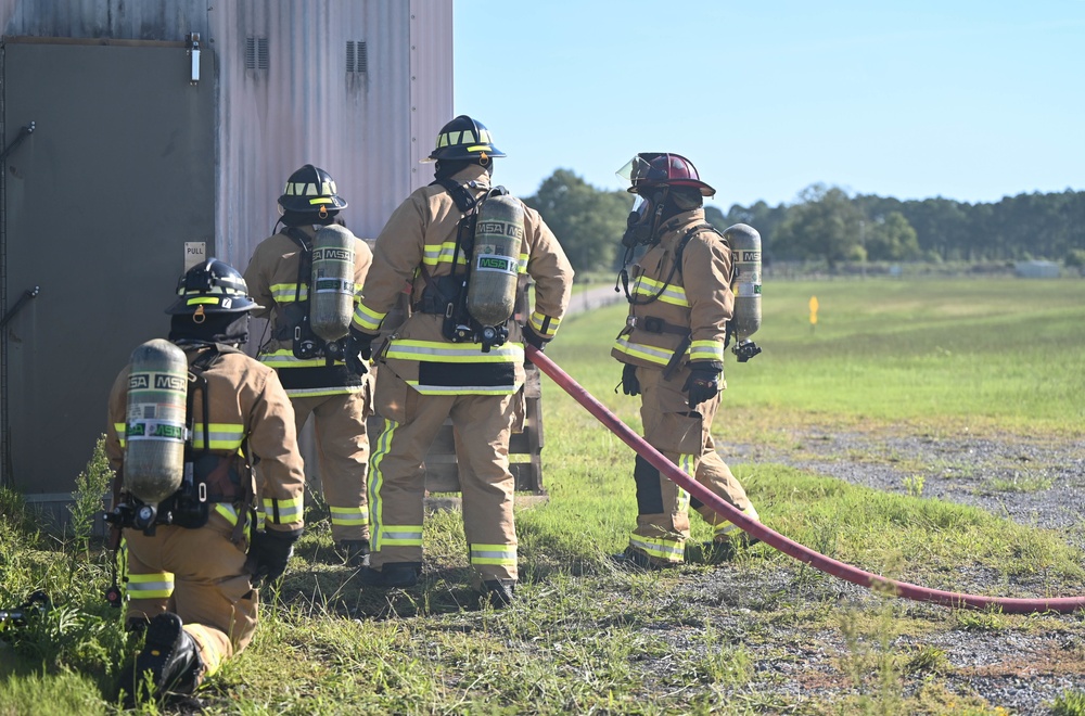 908 CES firefighters conduct annually required structure fire training