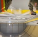 ROTC witness aircraft hangar fire suppression testing in Qatar