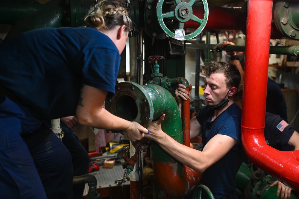 USCGC Thetis (WMEC 910) engineers make engine repairs