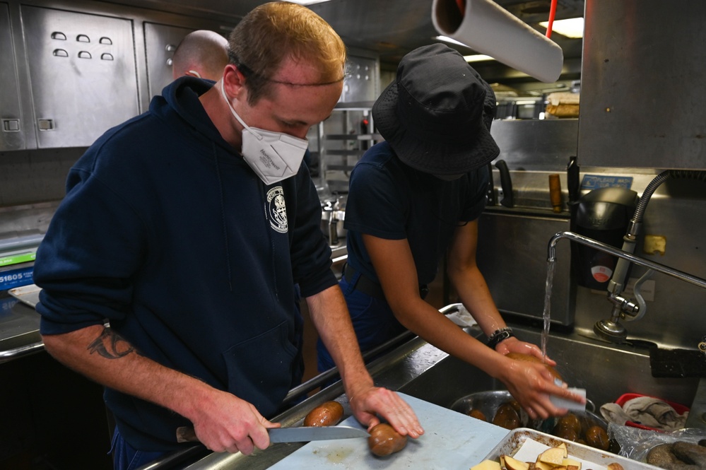 USCGC Thetis (WMEC 910) culinary specialists prepare meals