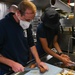 USCGC Thetis (WMEC 910) culinary specialists prepare meals