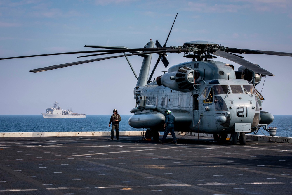 U.S. and Finnish naval ships sail in formation