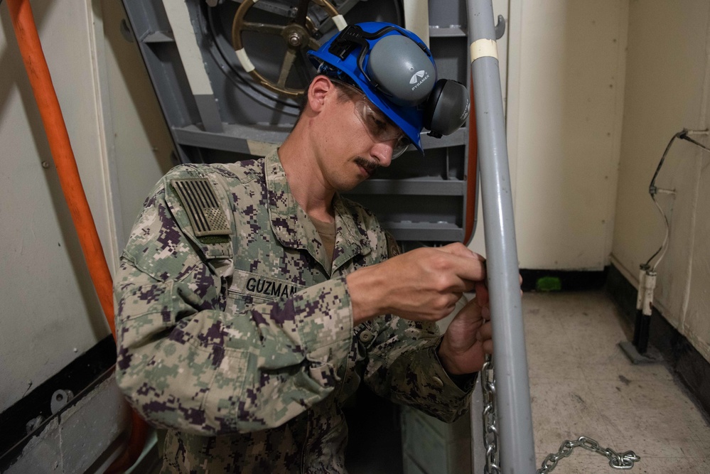 Sailor replaces safety chain