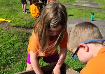 Fort McCoy archaeology team shares knowledge with youth during July 2022 South Post dig