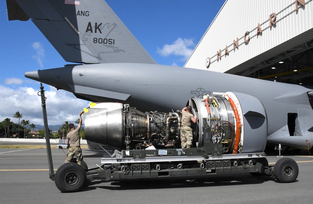 735th AMS performs rare en route C-17 engine change