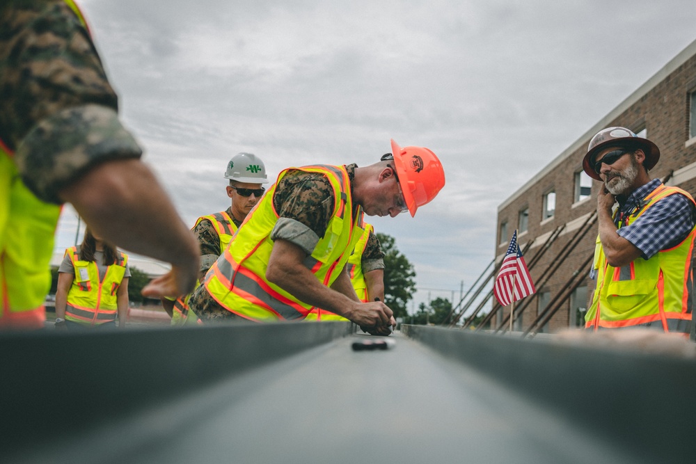 2nd Marine Logistics Group conducts topping out ceremony at new headquarters construction site