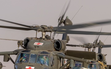 11th CAB medevac Black Hawk helicopters in-flight
