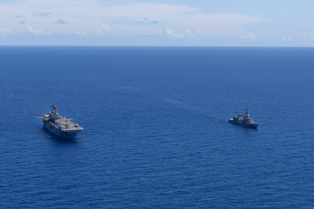 USS Tripoli and JS Ohnami Sail in Formation