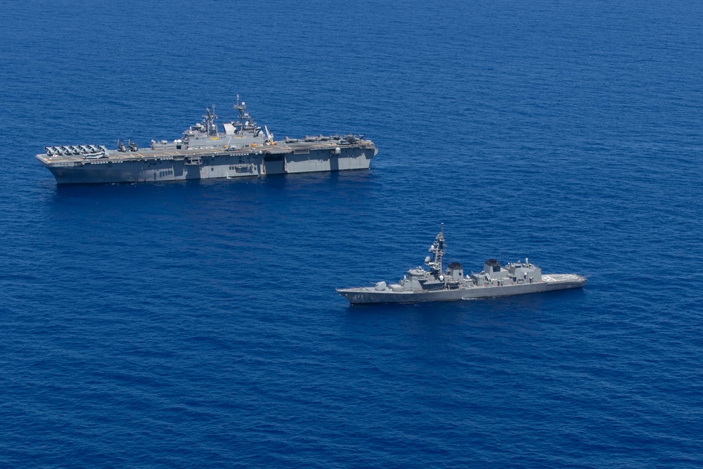 USS Tripoli and JS Ohnami Sail in Formation