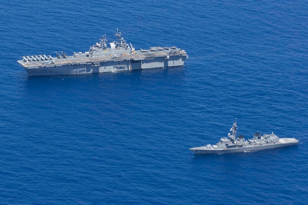 USS Tripoli and JS Ohnami Sail in Formation