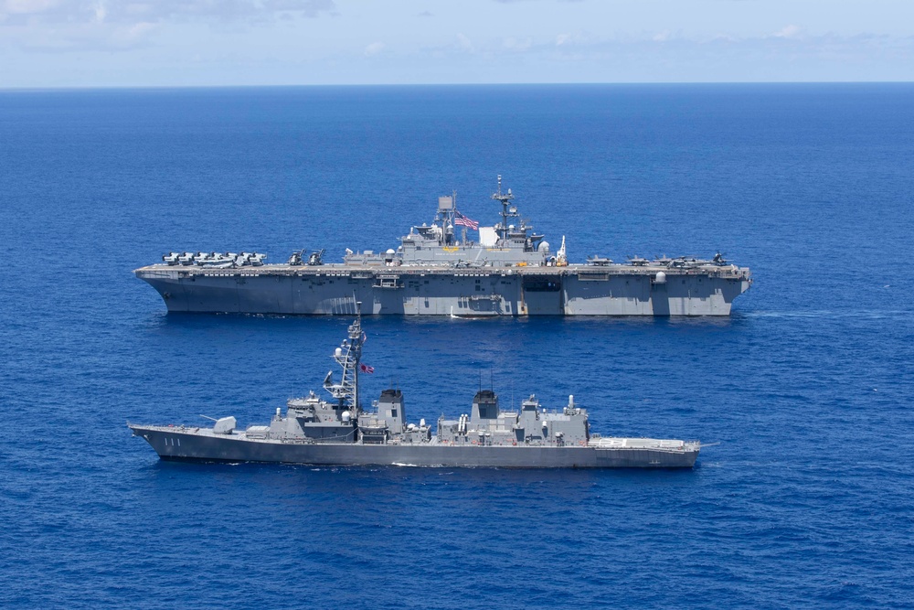 USS Tripoli and JS Ohnami Sail in Formation