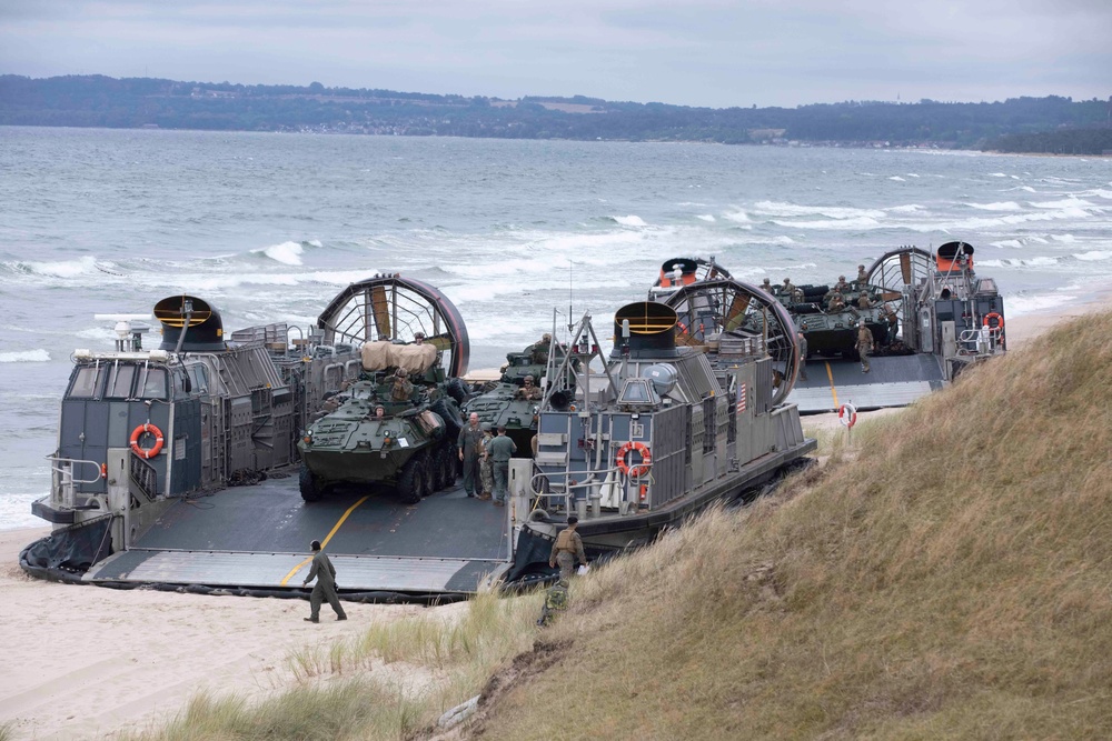 Landing Craft, Air Cushion unload vechicles ashore