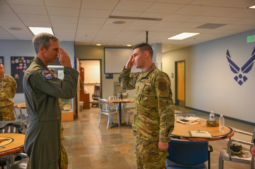 Maj. Gen. Bryan Radliff coins Staff Sgt. Zelek McNeilly