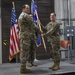 477th Fighter Group commander, passes the guidon to new 477th Maintenance Squadron commander