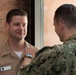 Musician 1st Class Jeff Harrigan is pinned upon arrival at U.S. Navy Band