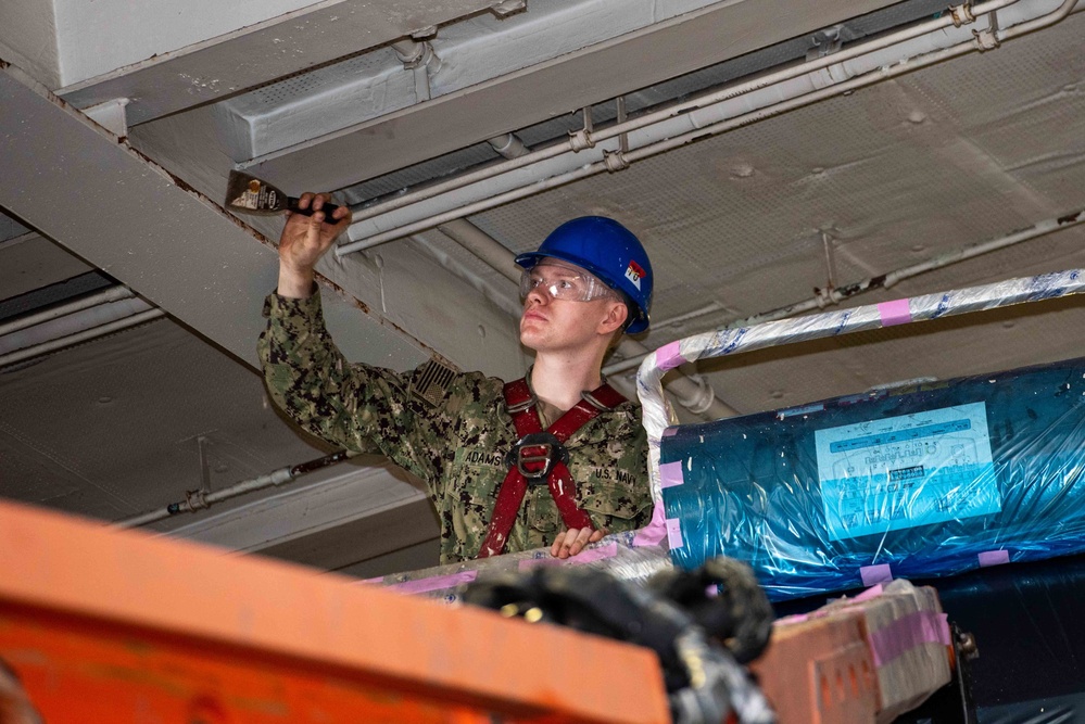 USS Ronald Reagan (CVN 76) Sailors perform overhead maintenance